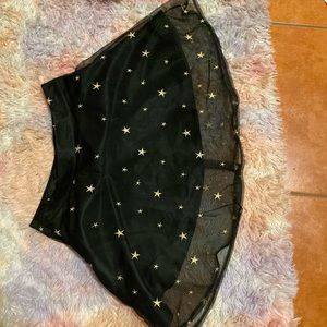 Black skirt with star embroidered mesh on top